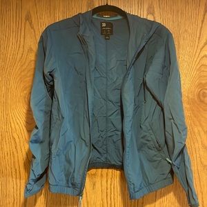 Girls XL In Motion teal windbreaker jacket